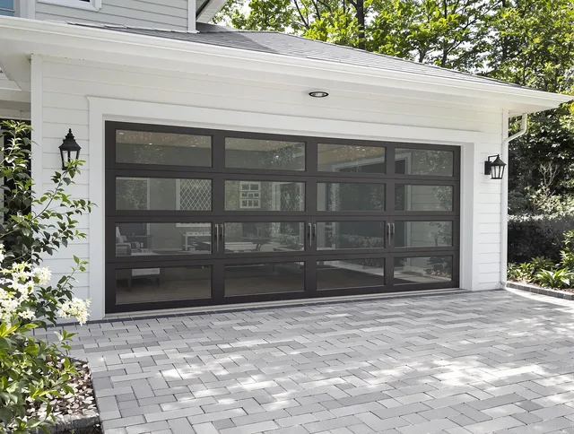 Maynard Garage Door Repair design specialist presenting custom garage door options to Maynard homeowner