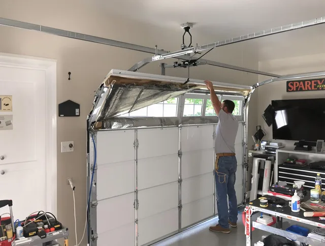 Garage door section replacement by Maynard Garage Door Repair in Maynard